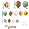 A set of balloons featuring various colors and patterns including orange giraffe print, brown, light green, white, and gold.