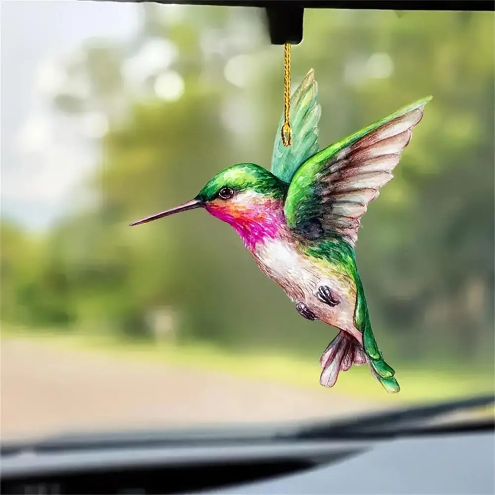 Colorful acrylic hummingbird suncatcher hanging ornament with iridescent green and pink feathers