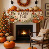 An autumn harvest fireplace mantel scarf featuring pumpkins and maple leaves above a fireplace.