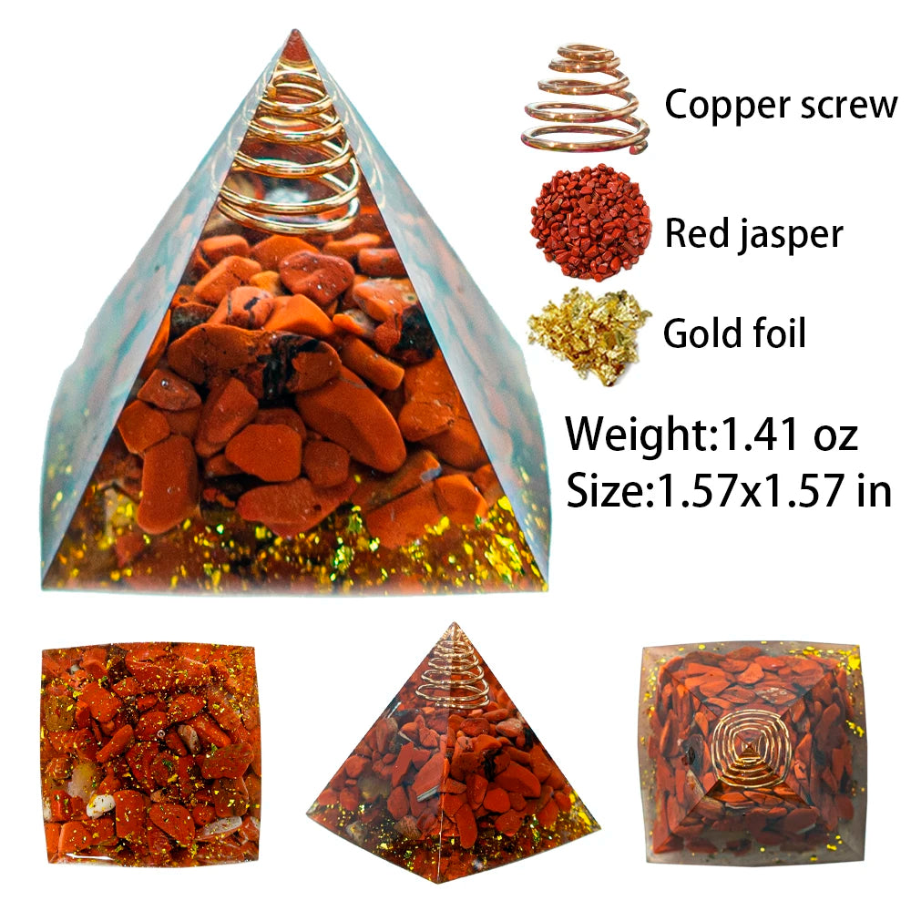A pyramid-shaped crystal display featuring red jasper, gold foil, and a copper screw.