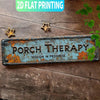 A vintage, rusted aluminum sign with the text PORCH THERAPY and SESSION IN PROGRESS, set against a dark wooden background.