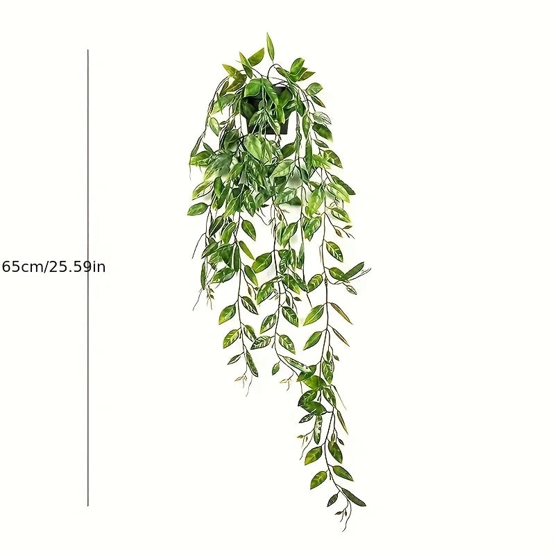 A long, cascading arrangement of artificial green leaves used for home decor.