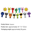A set of colorful, stylized character stickers or toys resembling various alien and animal faces.