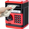 A hand is inserting a stack of US dollar bills into a red and black piggy bank coin money saver.