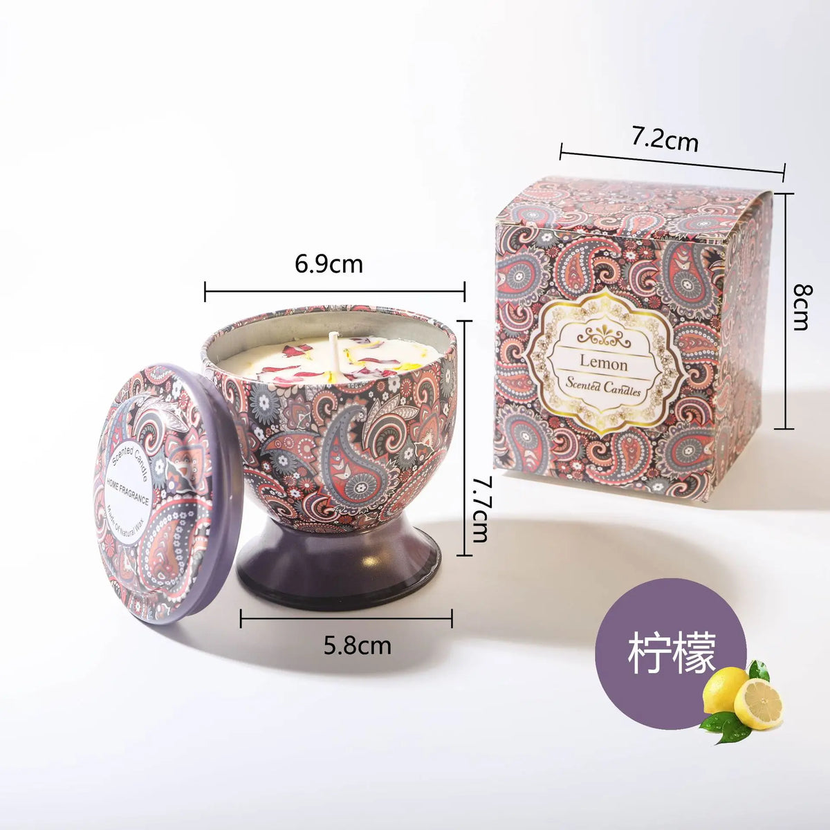 A gift set featuring a candle in a glass holder and a box, with a lemon illustration nearby.