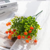 Artificial eucalyptus branch with seven stems, a green faux plant for home decor and wedding