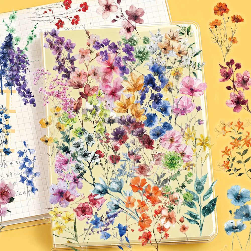 A transparent sheet of floral decal stickers featuring various watercolor-style flowers in pink, purple, orange, and blue hue