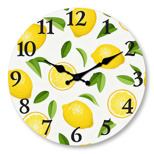 A round wall clock face featuring yellow lemons and green leaves as decorative elements.