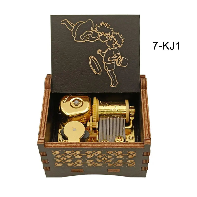 A small wooden box containing a brass music box mechanism and an illustration of a character.