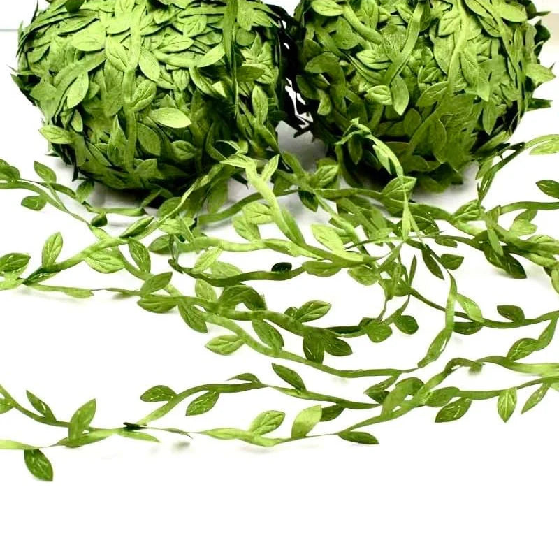 Two spherical bundles of artificial green climbing vine foliage