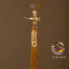 Brass gourd and five emperor coins hanging ornament made of gold-toned metal and silk thread