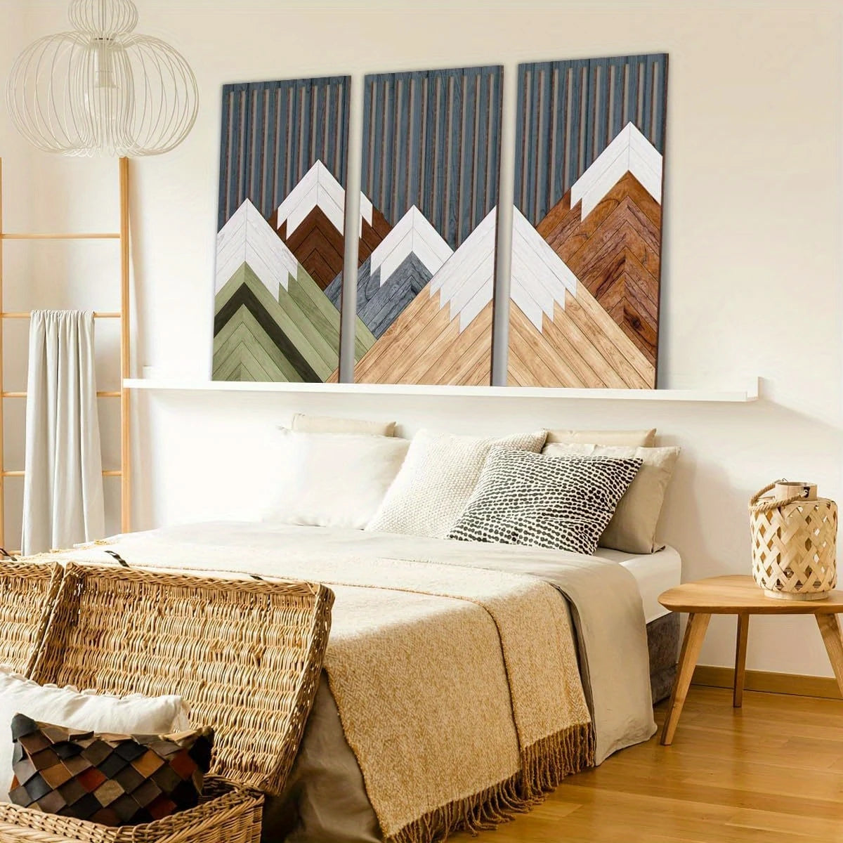 A set of three vertical wood leaf wall art pieces featuring mountain landscapes in muted earth tones and gray.