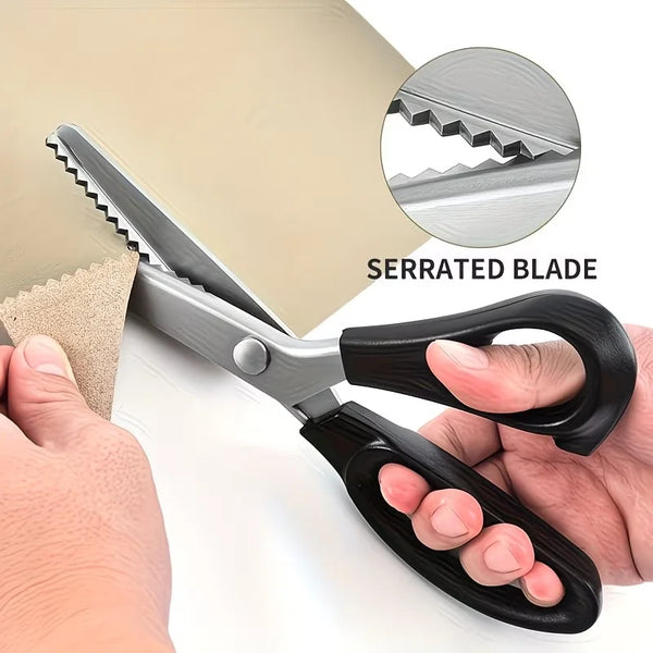 A pair of stainless steel pinking scissors with a serrated blade being held by a hand.