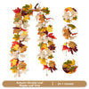 Artificial double leaf maple vine garland featuring autumn colors in various shades of red, orange, yellow, and brown.