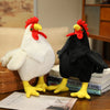 A white plush rooster toy and a black plush rooster toy are displayed on a wooden surface.