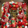 A festive balloon decoration set featuring red, gold, and green balloons arranged in a Christmas wreath display.