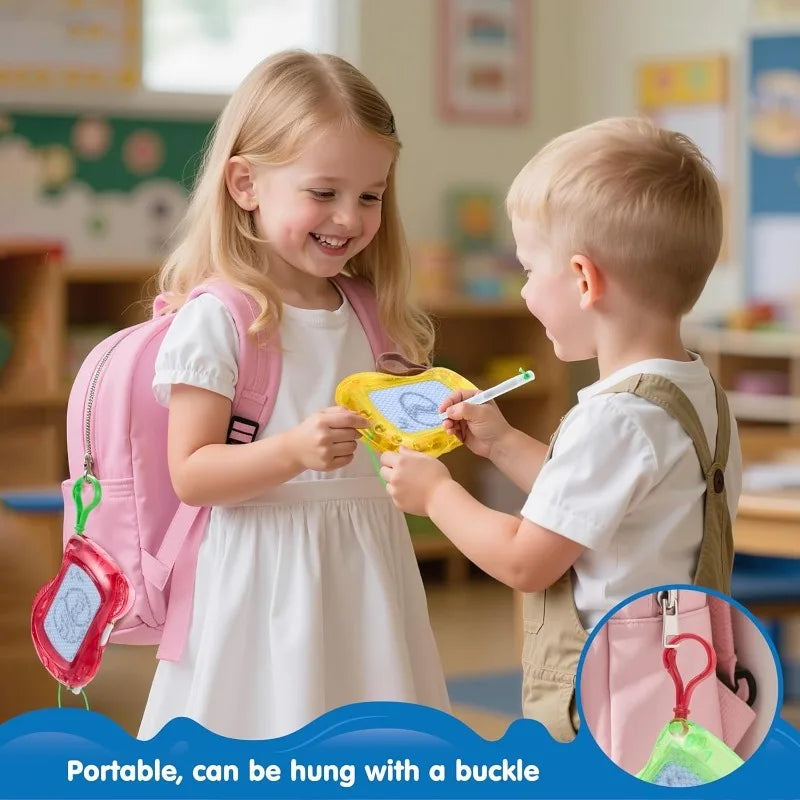 A young girl and boy are drawing on a yellow magnetic board, demonstrating the portable mini magnetic drawing boards with key