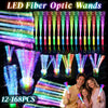 A collection of LED fiber optic glow wands in various colors and shapes displayed against a dark background.