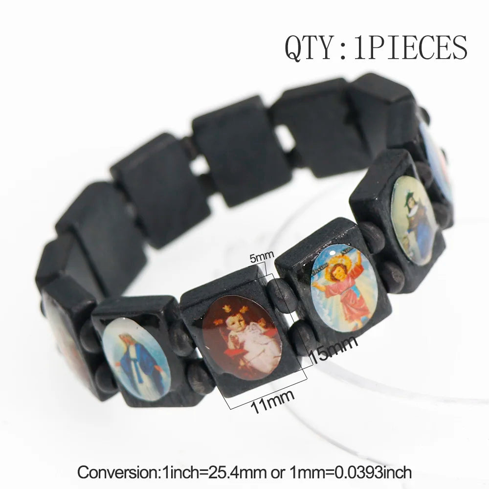 Black wooden rosary bracelet featuring charms of the Virgin Mary and Jesus