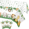 A white fabric banner featuring a jungle safari pattern with various animal illustrations and green foliage.