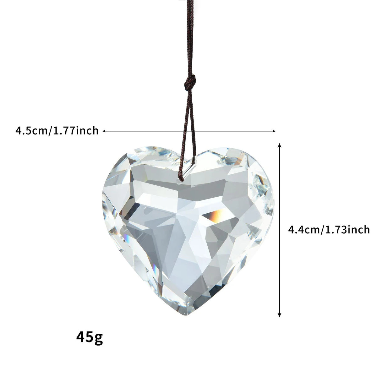 Clear heart-shaped crystal pendant with a dark brown cord for window decoration