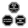 Two black hexagonal enamel pins showing 'BAJO NIVEL DE PACIENCIA' and 'EXCESO DE DUDAS'
