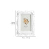 White ornate photo frame with a floral design and a light beige rose illustration.