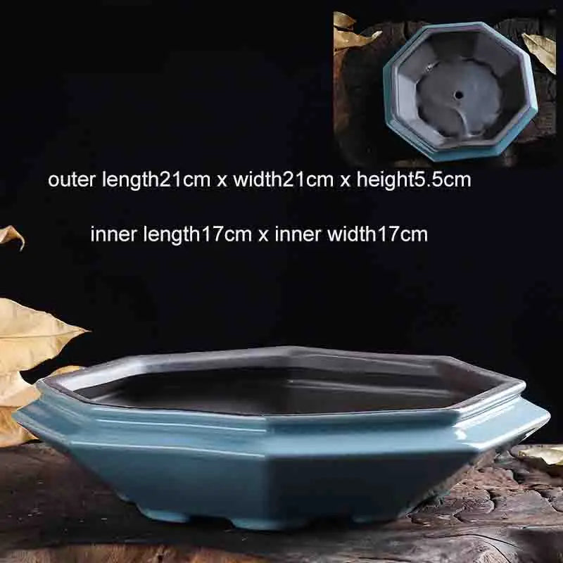 A blue glazed ceramic bonsai flower pot shown with its inner and outer dimensions displayed.