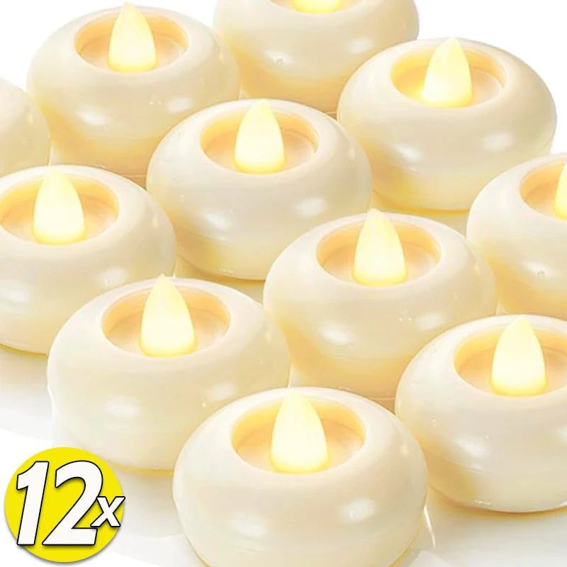 A collection of white LED floating sensor tealight candles in various sizes and shapes.