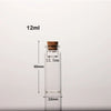 A clear glass bottle with a cork stopper, labeled 12ml and dimensions 60mm by 22mm.