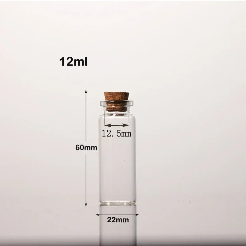 A clear glass bottle with a cork stopper, labeled 12ml and dimensions 60mm by 22mm.