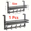 A silver over-the-door organizer rack with multiple tiers for storage.