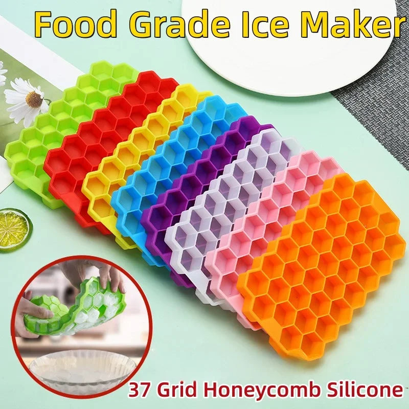 A variety of colorful grid silicone molds for making ice cubes and honeycombs