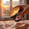 A hand holds an aromatherapy massage oil candle in an anti-scalding tin, with melted oil dripping onto fabric.