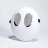 A white, spherical mask resembling a face with large black eye openings and black straps.
