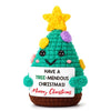 Handmade crochet Christmas tree ornament shaped like a green tree with a yellow star topper