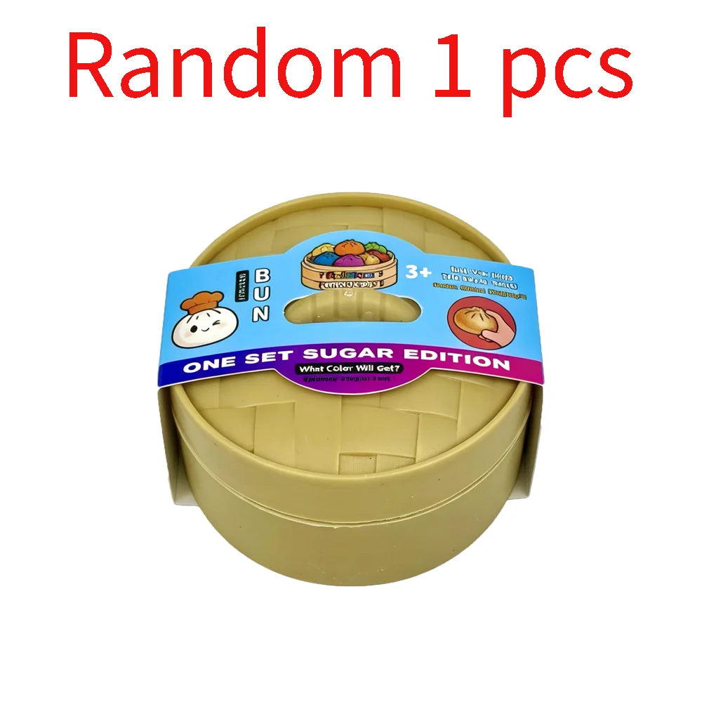 A single yellow squishy toy shaped like a dumpling is shown in a clear plastic container.