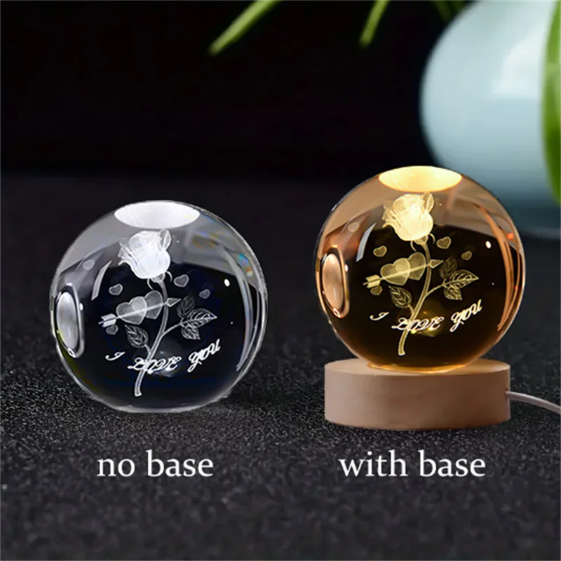 A comparison of a 3D crystal ball night light without a base and with a wooden base.