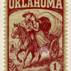 A vintage red postage stamp featuring a woman and a cowboy riding a horse against a background of hay bales and grass.