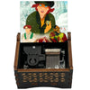A hand-cranked wooden music box featuring characters from Once Upon a December on the lid.