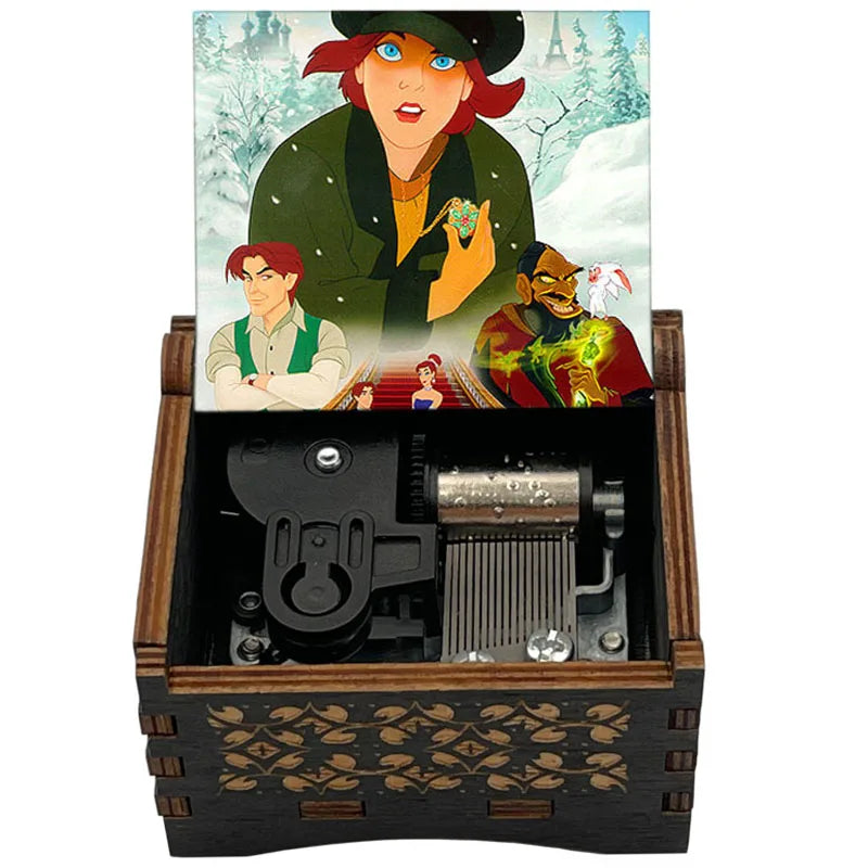 A hand-cranked wooden music box featuring characters from Once Upon a December on the lid.