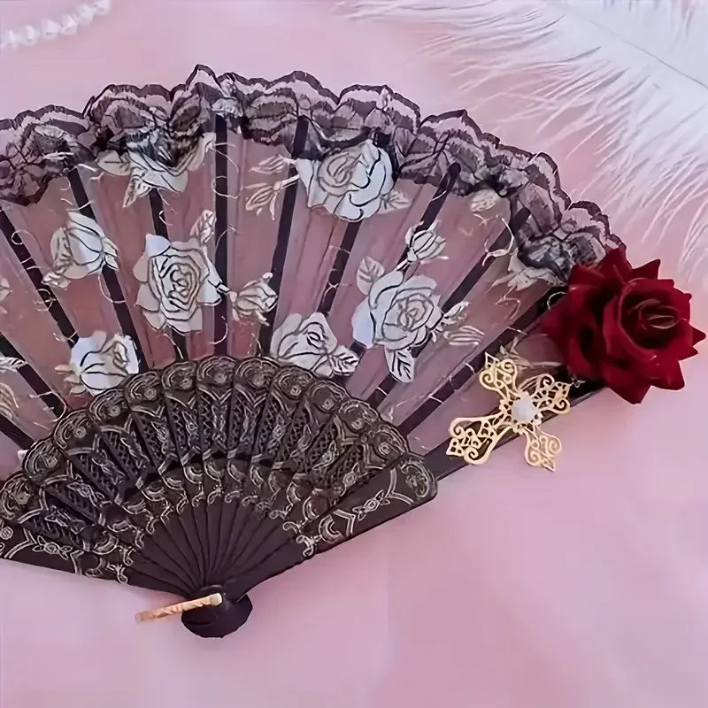 Vintage flamenco rose handheld folding fan with black and pink floral patterns