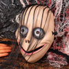 A creepy full face horror costume mask resembling an evil clown with large eyes and a wide smile.