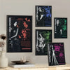 A collection of dark, stylized posters featuring characters from the Resident Evil franchise displayed on a white wall.