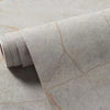 Roll of matte marble self-adhesive waterproof wallpaper showing subtle orange veining