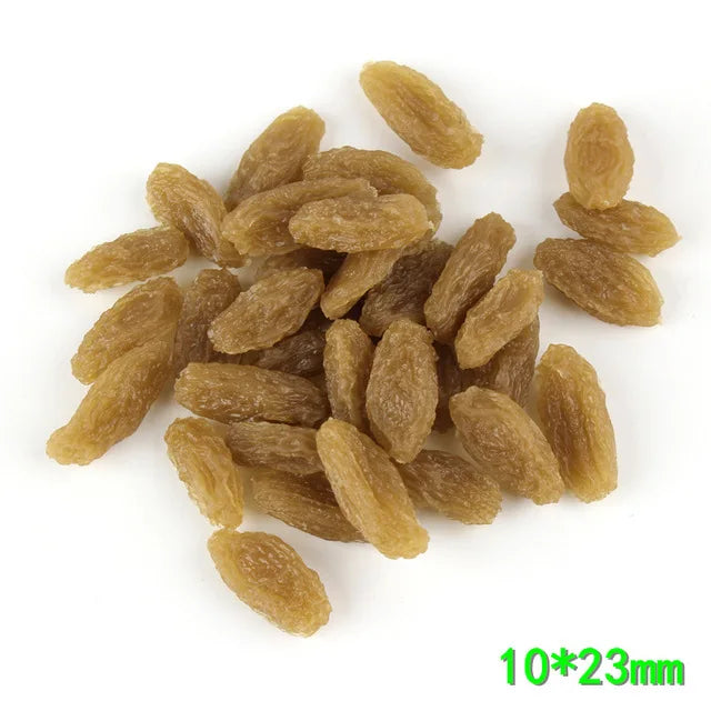 A pile of golden, dried corn kernels or mini-corn pieces for crafting and décor.