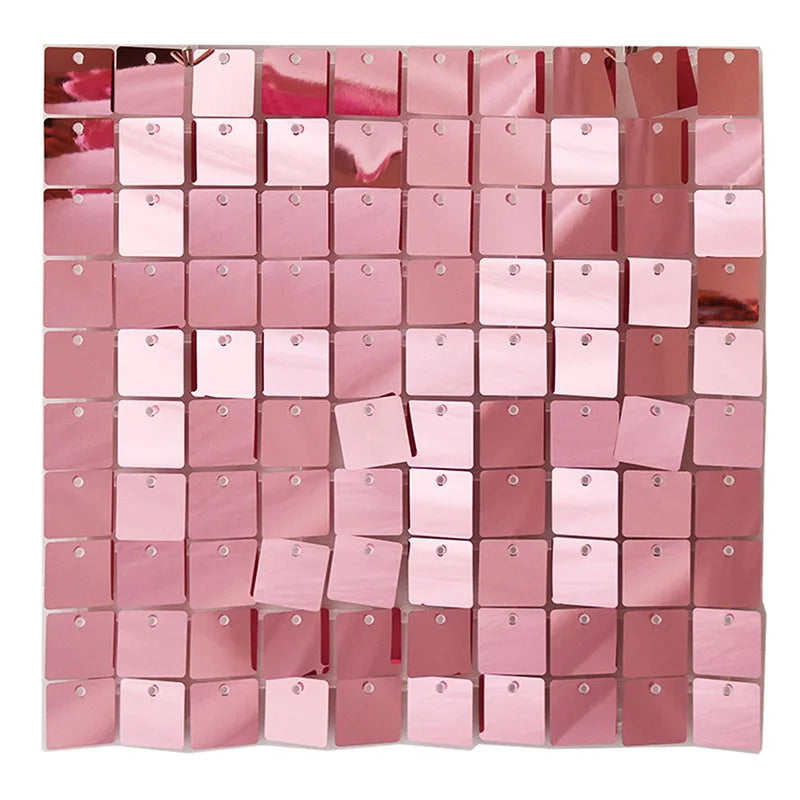 Square iridescent pink sequin shimmer wall panels arranged in a grid for a sparkling backdrop.