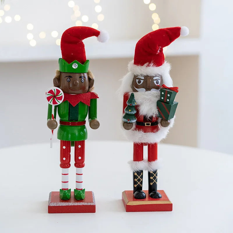 A pair of handcrafted wooden nutcracker soldier figurines dressed in festive red and green outfits.