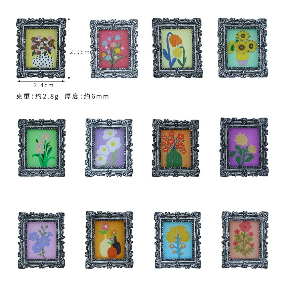 A collection of miniature framed wall art featuring floral designs in various colors and styles.