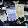 A collection of iridescent butterfly stickers in various shades and finishes for journaling and crafts.